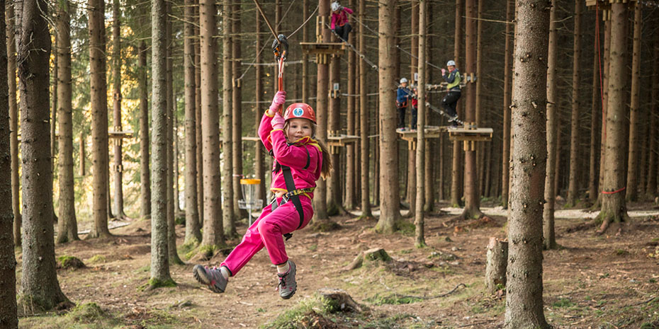 Gjøvik Klatrepark jente i klatresele|